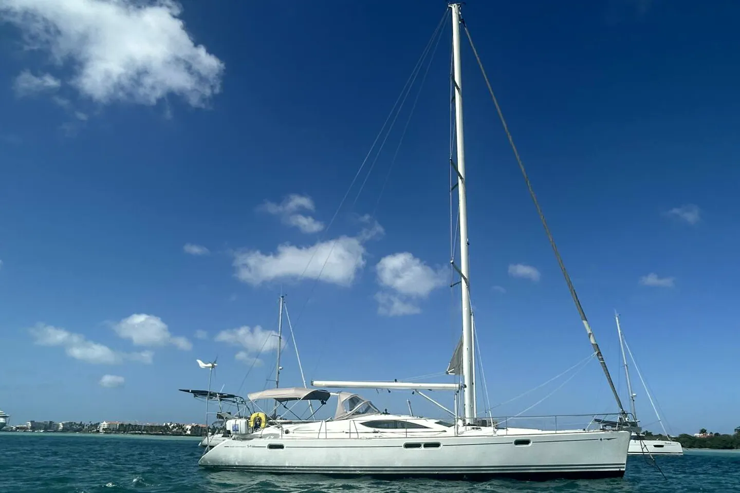 A Jeanneau Sun Odyssey 54DS at a dock
